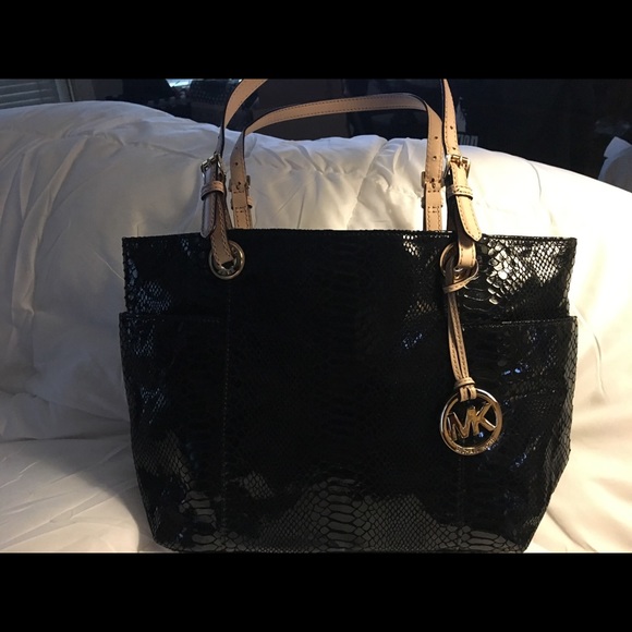 Michael Kors Handbags - Michael Kors Jet Set Embossed leather tote